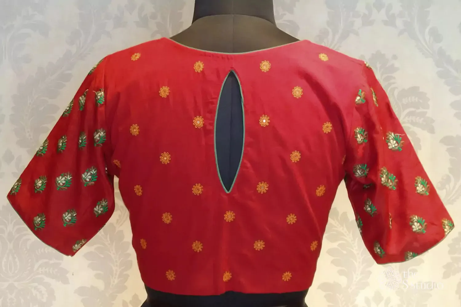 Red cotton blouse with all over embroidery