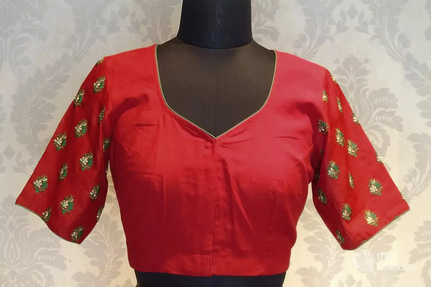 Red cotton blouse with all over embroidery